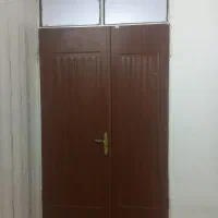 درو پنجره آهنی و اپارتمانی