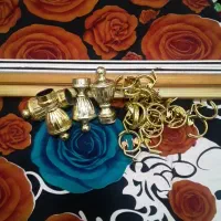 چوب پرده طلایی و سرب پرده