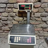 ترازو. وتلویزیون