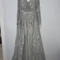 لباس مجلسی و یک عدد مانتوی مجلسی سایز ۳۸(مانکن)