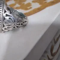 انگشترفیروزه مغزسنگ ۲طرف رخ دلفین پرستوروی سنگ|جواهرات|بومهن, |دیوار