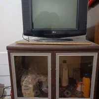 تلویزیون ال جی همراه با میز