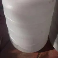 دبه خیار شور وبطری آب معدنی