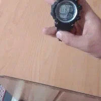 چند تکه لوازم و یک ساعت مچی