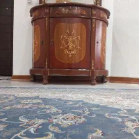 آینه و کنسول و شمعدانی