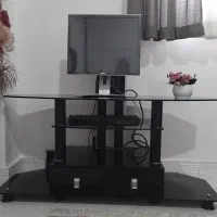 میز تلویزیون شیشه ای کشودار