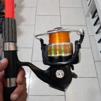 ست چوب وچرخ ماهیگیری