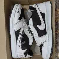 کتونی تراویس