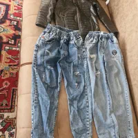 دوعدد شلوار لی و یک عدد کاپشن نو