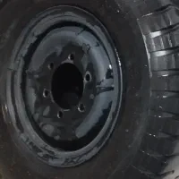 یه تا لاستیک عقب سایپا بالای پناه درصد با رینگ