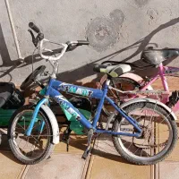 دو عدد دوچرخه و یک چهارچرخه در حد نو