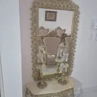 اینه و شمعدان برنجی