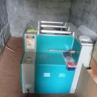 دستگاه رول کن سفره یکبار مصرف و نایلون