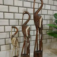 سه عدد مجسمه چوبی لک لک