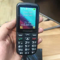 گوشی دکمه ای Middcell M230 همراه با پایه شارژر