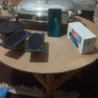 میزچوبی گرد و همه چیذاش فروش اند