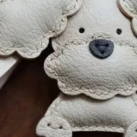 عروسک چرمی دست دوز