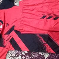 دست لباس ورزشی