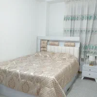 تخت خواب دونفره همراه با دو عدد پاتختی و میز آرایش