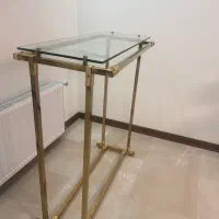 اویز لباس|بندرخت و رخت‌آویز|تهران, میدان ولیعصر|دیوار