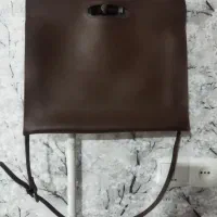 کیف|کیف، کفش، کمربند|قم, خندق|دیوار