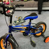 دوچرخه بچگانه سایز ۱۰ رنگ آبی کاملا نو