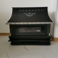 بخاری گازی طرح شومینه