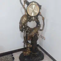 ساعت ایستاده و چوب بالاس