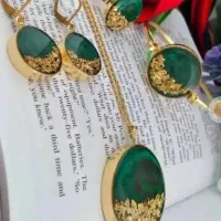 انواع گردنبند،گوشواره،ست ونیمست رزینی باطرح دلخواه