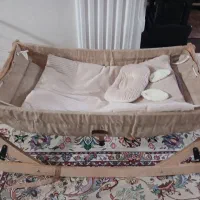 ننو کودک گهواره ای