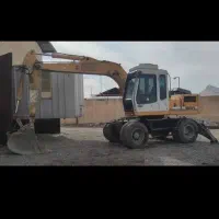 پیمانکاری واجاره بیل مکانیکی لاستیکی باپیکور