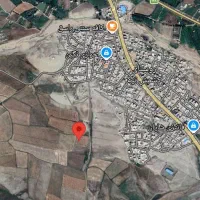 زمین خارج طرح در کشمش تپه،روبروی درمانگاه جدید