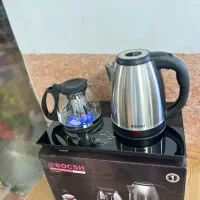 چای‌ساز بغل همی برند بوش