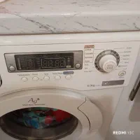 لباسشویی سامسونگ و میز ناهار خوری