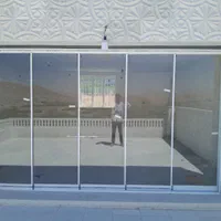بالکن شیشه ای چهار فصل
