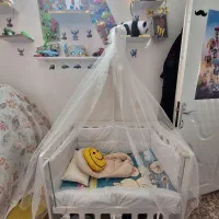 تخت کنار مادر گهواره ای