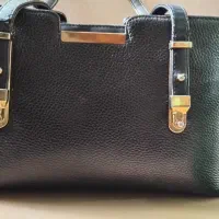 کیف چرم نسبتا بز رگ|کیف، کفش، کمربند|رشت, فلسطین|دیوار