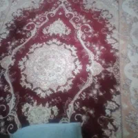 بعلت بدهی فرش دست دوم فروشیه
