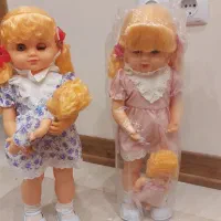 عروسک قدیمی با بچه|اسباب‌‌بازی|اصفهان, باغ دریاچه|دیوار