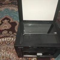 پرینتر سه کاره کنون و ۴ عدد صندلی ثابت ومقدار چمن