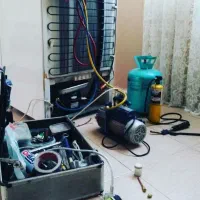 تعمیر یخچال .درب منزل .