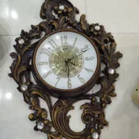 ساعت دیواری وچرخ گوشت