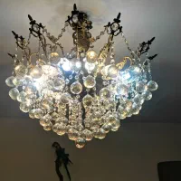 یک عدد لوستر برنز 14 شاخه و دیوارکوب