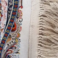 کارگر همراه با گواهینامه رانندگی کار در قالیشویی