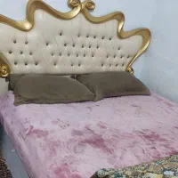 تخت خواب و زیر تلویزیونی