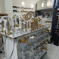 هود،اجاق گاز،سینگ،شیرآلات،پکیج و