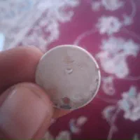 یک عدد سکه 2ریالی شاهی
