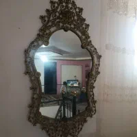 آیینه و دو عدد شمع دانی