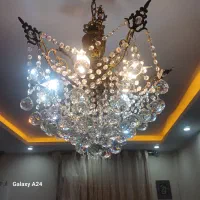 لوستر برنجی ۵ شعله و ۵ شاخه با ریسه و گوی اتریشی