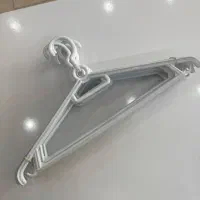 آویز لباس چوب لباسی